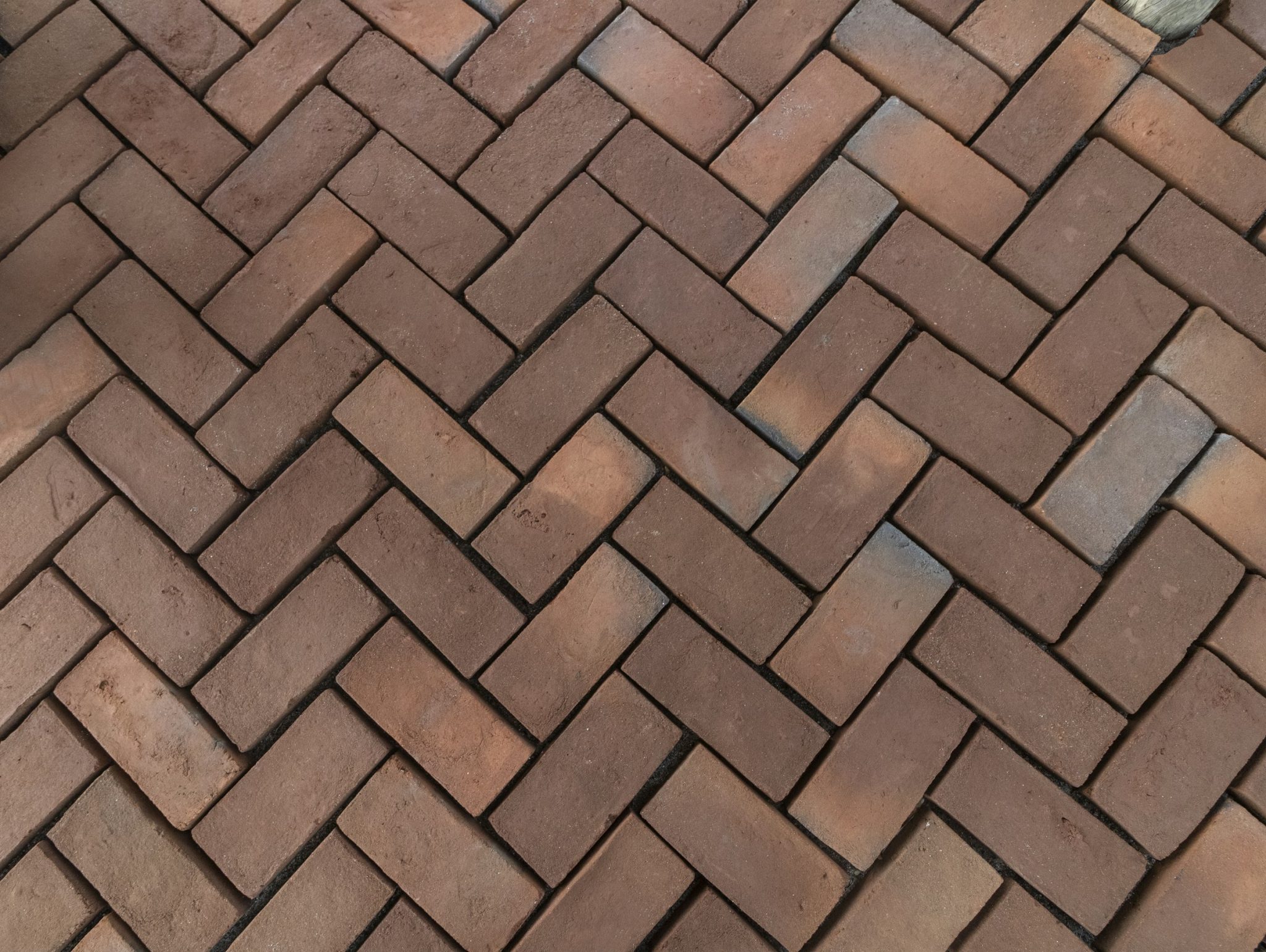 a-close-up-of-a-wall-made-of-small-tiles-ign2xfb-a5i